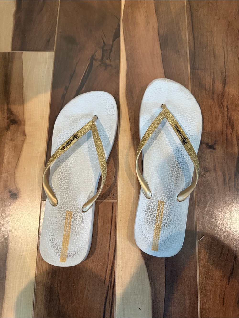Havaianas Women's White Footbed Flip Flops with Gold Glitter Straps